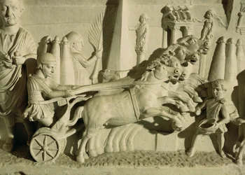 Relieve que representa una carrera de carros